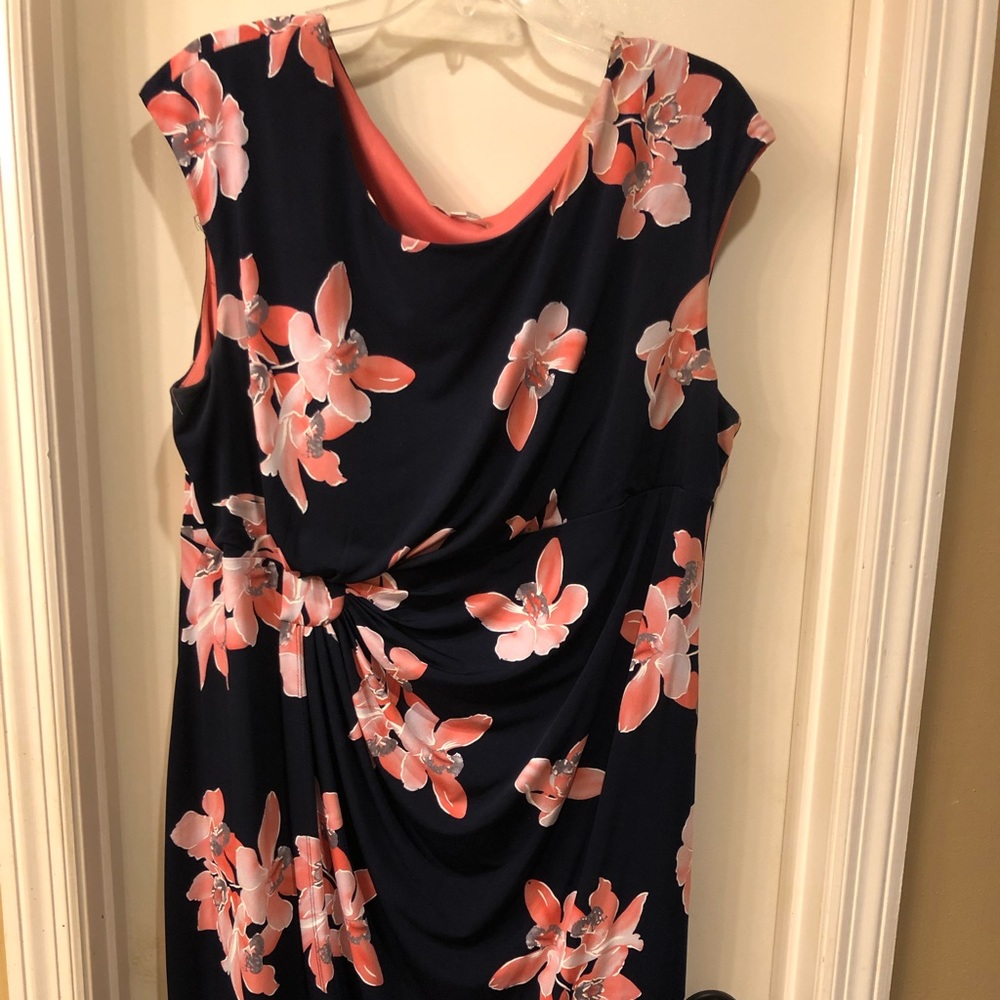 Peach/pink floral dress on dark Navy background